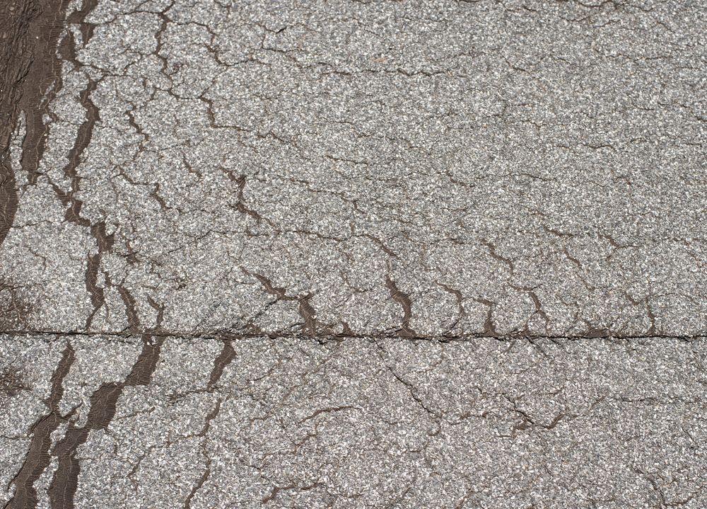 Daklekkage door scheuren in plat dak Lent Losliggend dakleer op plat dak in Lent